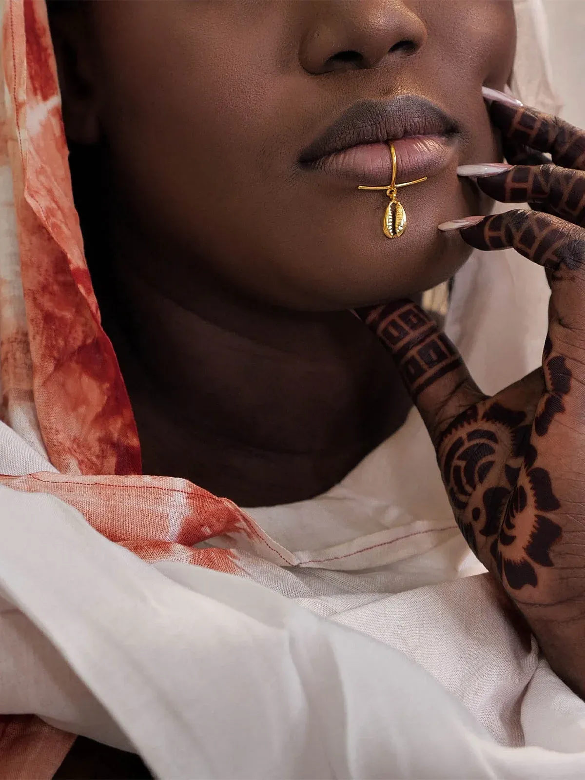 Lips Cauri bronze — le cauri en talisman