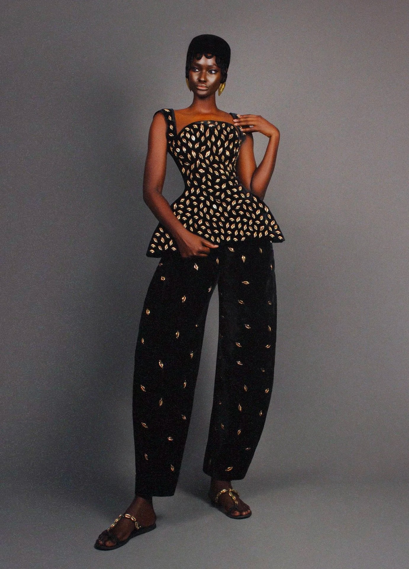 Petaw Top — bustier peplum et pantalon cauris dorés